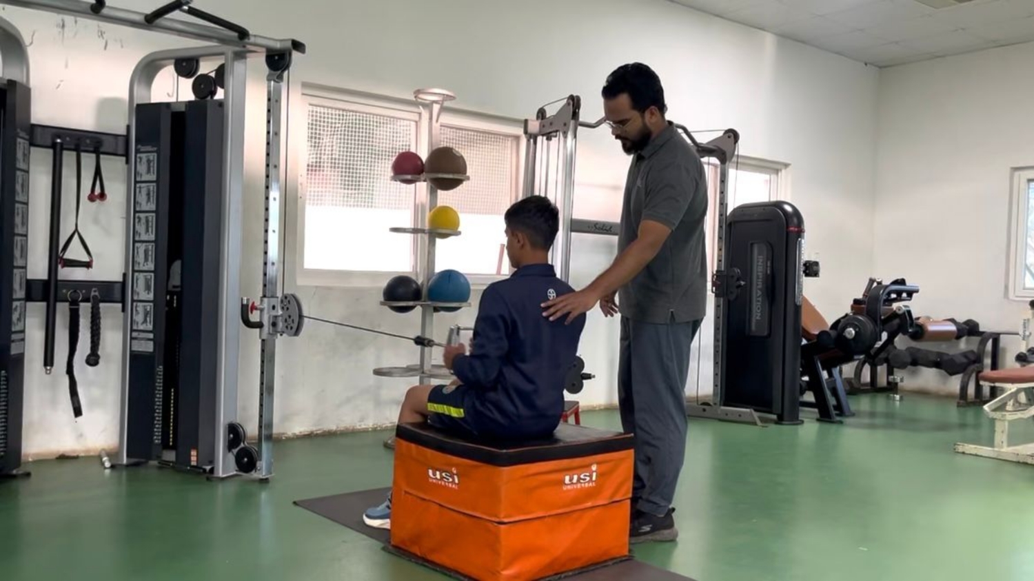 Physiotherapist assisting post-surgical rehabilitation